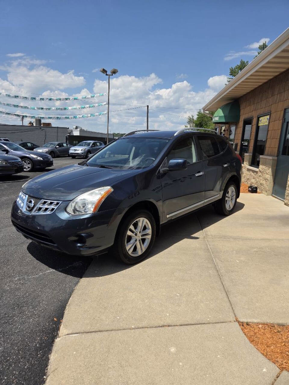 Used 2013 Nissan Rogue SV AWD/4WD image 1