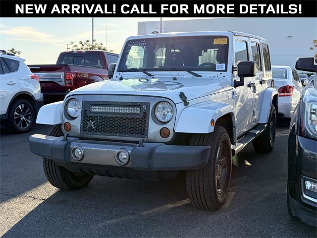 Used 2012 Jeep Wrangler Unlimited Sport image 1