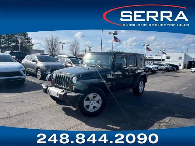 Used 2011 Jeep Wrangler Unlimited Sahara w/ Dual Top Group AWD/4WD image 1
