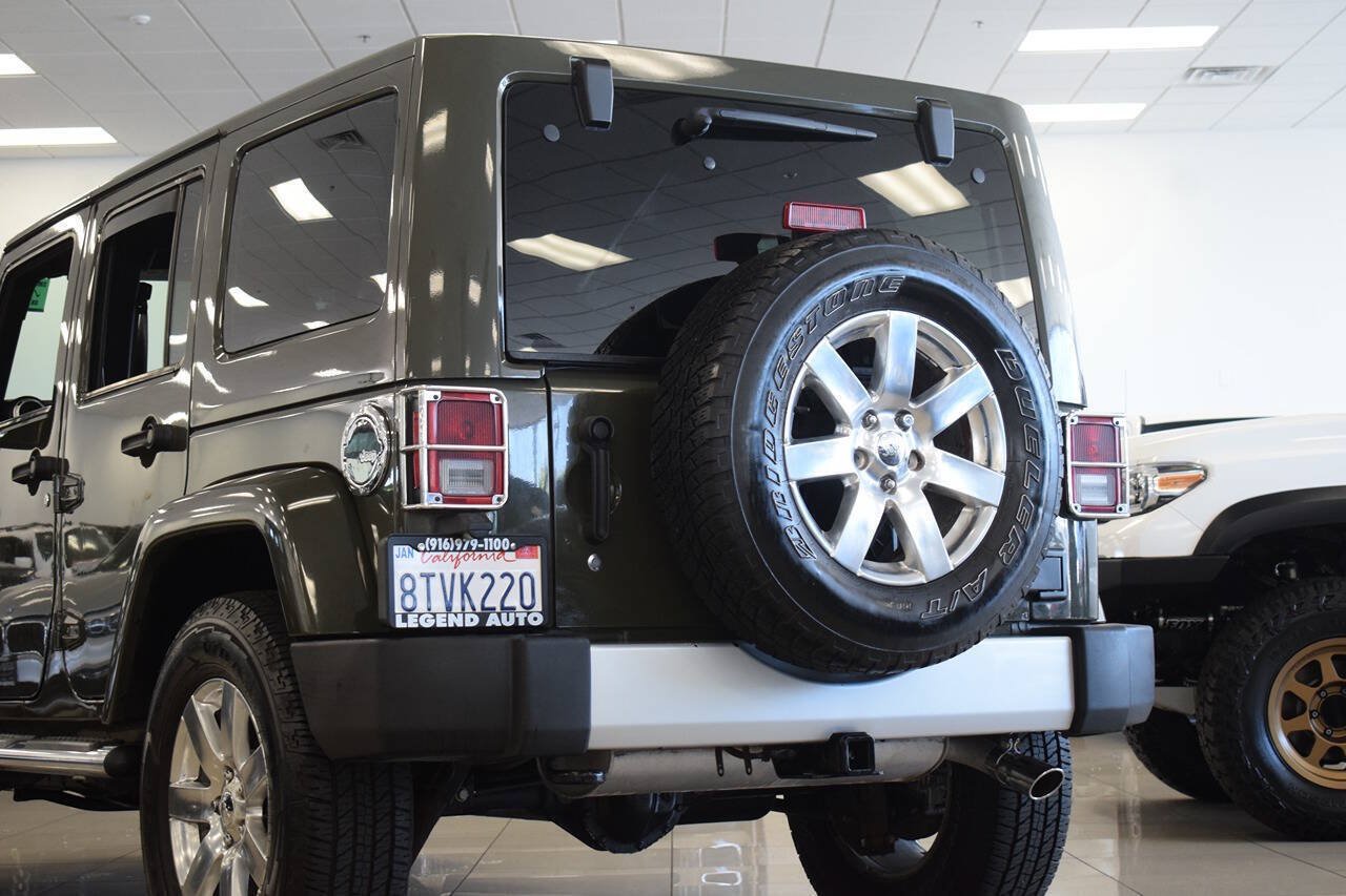 Used 2015 Jeep Wrangler Unlimited Sahara w/ Dual Top Group AWD/4WD image 25