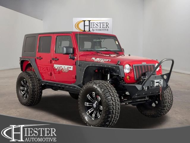 Used 2010 Jeep Wrangler Unlimited Rubicon w/ Dual Top Group image 1