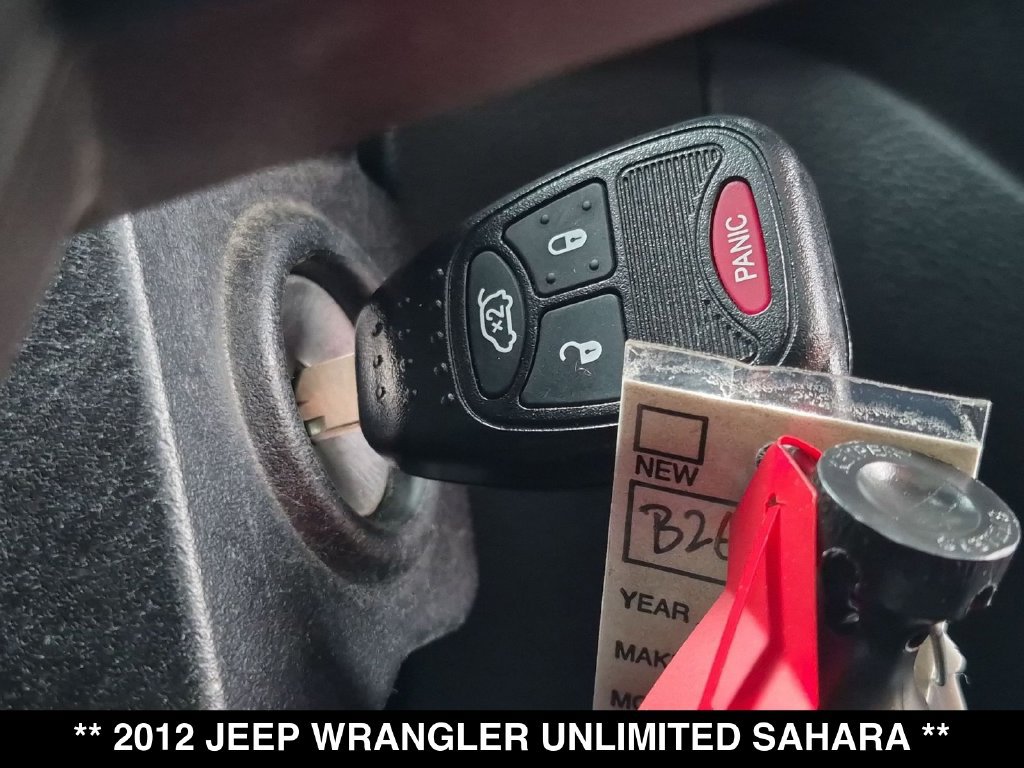 Used 2012 Jeep Wrangler Unlimited Sahara w/ Dual Top Group AWD/4WD image 26