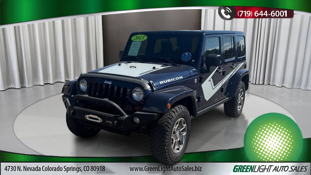 Used 2013 Jeep Wrangler Unlimited Rubicon w/ Dual Top Group AWD/4WD image 1