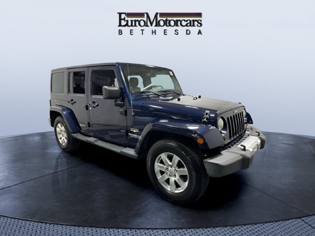 Used 2013 Jeep Wrangler Unlimited Sahara w/ Dual Top Group AWD/4WD image 7