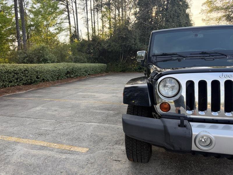 Used 2013 Jeep Wrangler Unlimited Sahara w/ Dual Top Group AWD/4WD image 17
