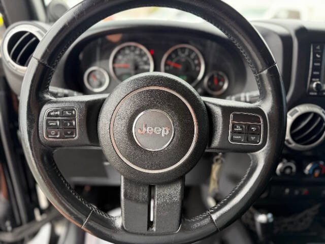 Used 2014 Jeep Wrangler Unlimited Sahara w/ Dual Top Group AWD/4WD image 11