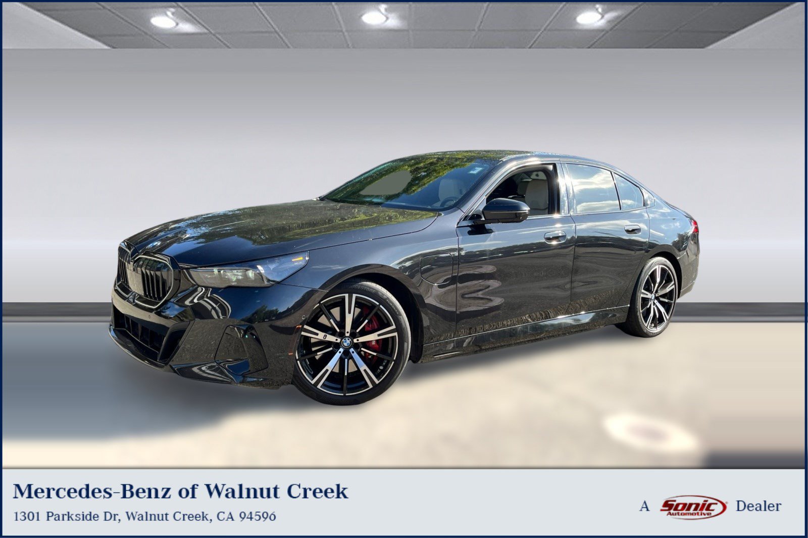 Used 2025 BMW 550e xDrive w/ Premium Package