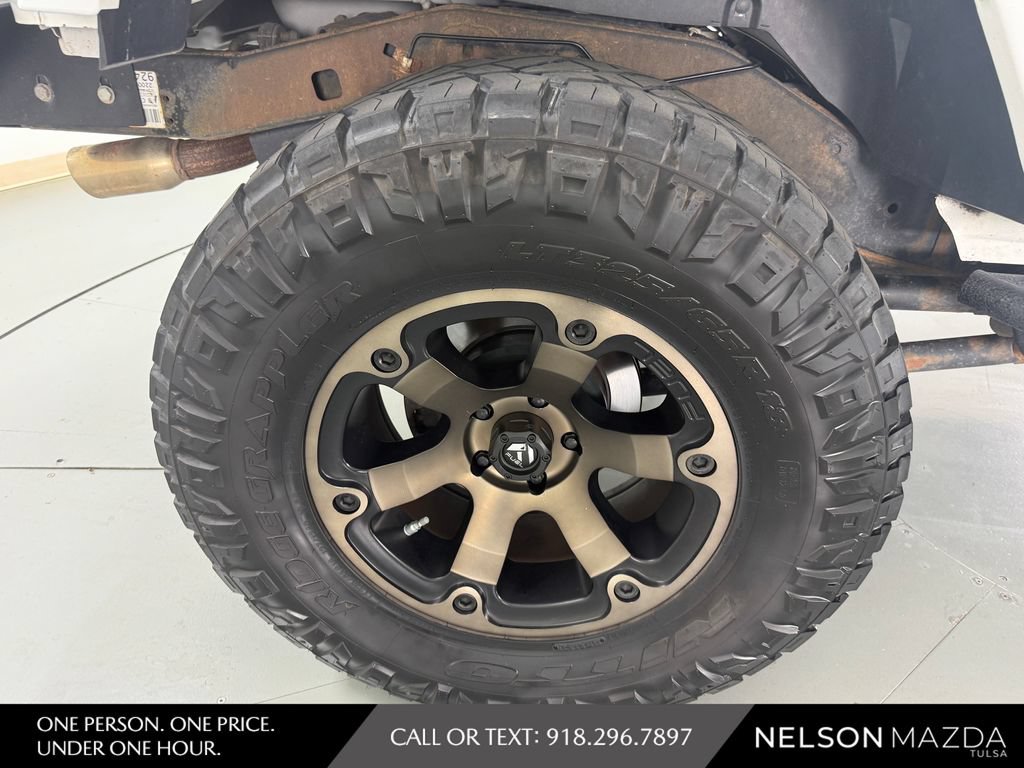 Used 2014 Jeep Wrangler Unlimited Sahara w/ Mopar Chrome Edition Group AWD/4WD image 13