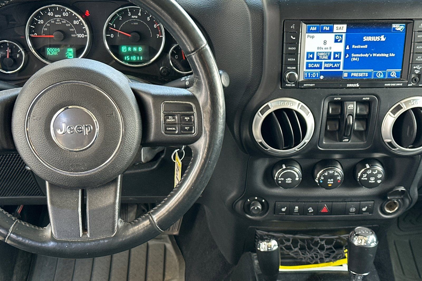 Used 2012 Jeep Wrangler Unlimited Sahara w/ Mopar Chrome Edition Group AWD/4WD image 9