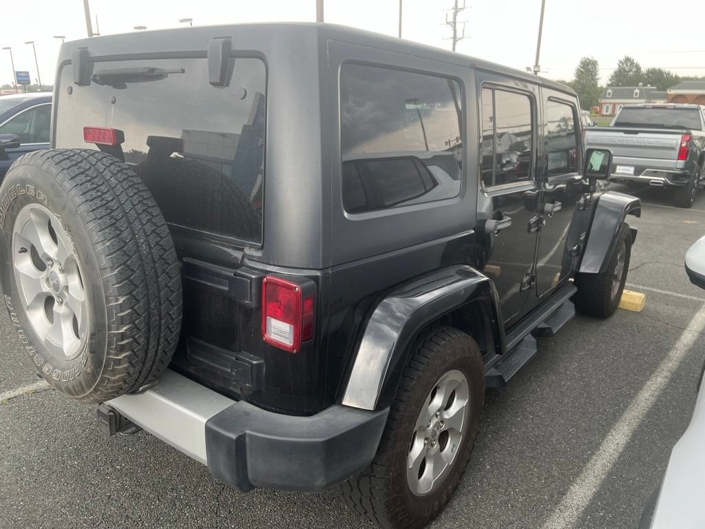 Used 2013 Jeep Wrangler Unlimited Sahara w/ Dual Top Group AWD/4WD image 3
