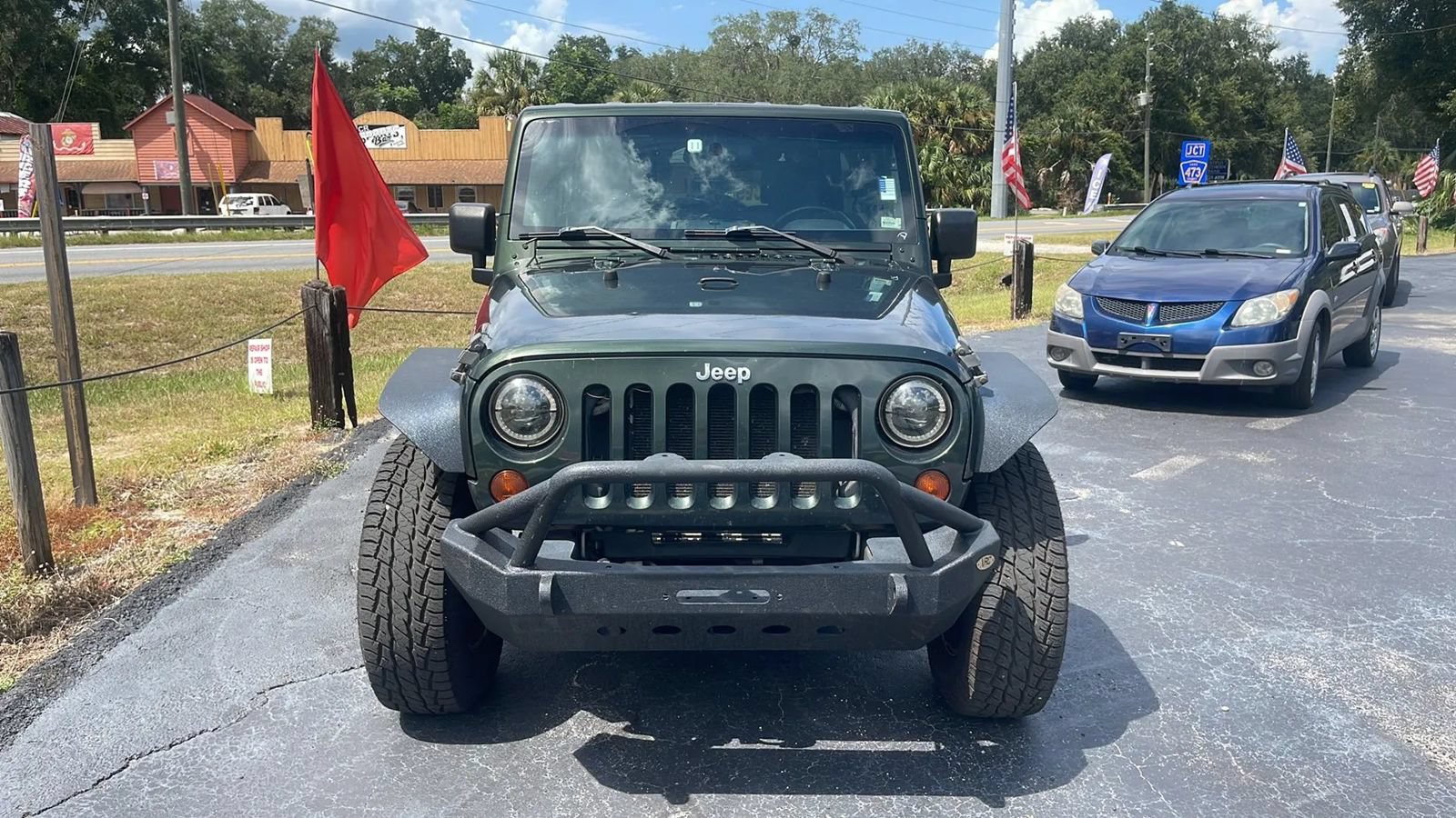 Used 2010 Jeep Wrangler Unlimited Rubicon w/ Dual Top Group AWD/4WD image 2