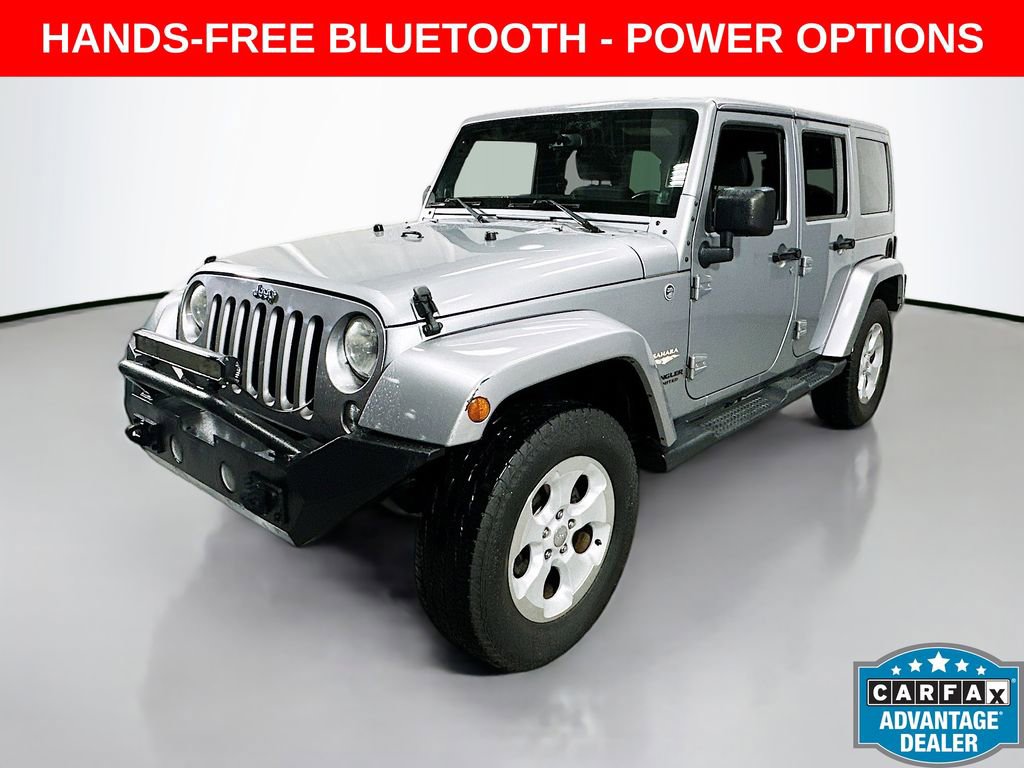 Used 2014 Jeep Wrangler Unlimited Sahara w/ Dual Top Group AWD/4WD image 2