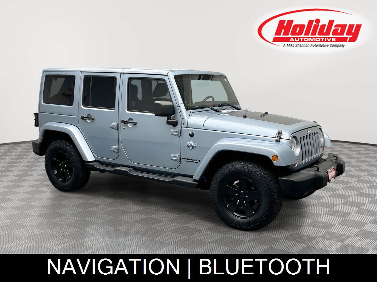 Used 2012 Jeep Wrangler Unlimited Sahara AWD/4WD image 1