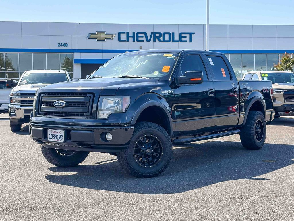 Used 2013 Ford F150 FX4 w/ Mid Equipment Group AWD/4WD image 1