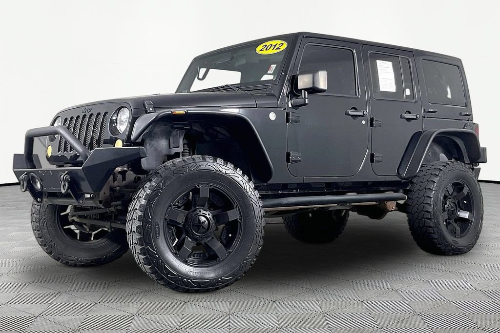 Used 2012 Jeep Wrangler Unlimited Sahara AWD/4WD image 1