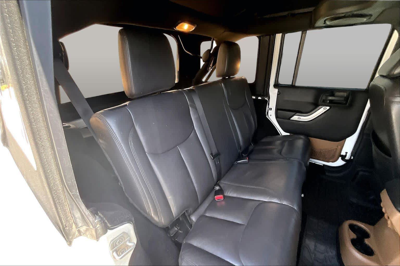Used 2014 Jeep Wrangler Unlimited Sahara w/ Dual Top Group AWD/4WD image 16