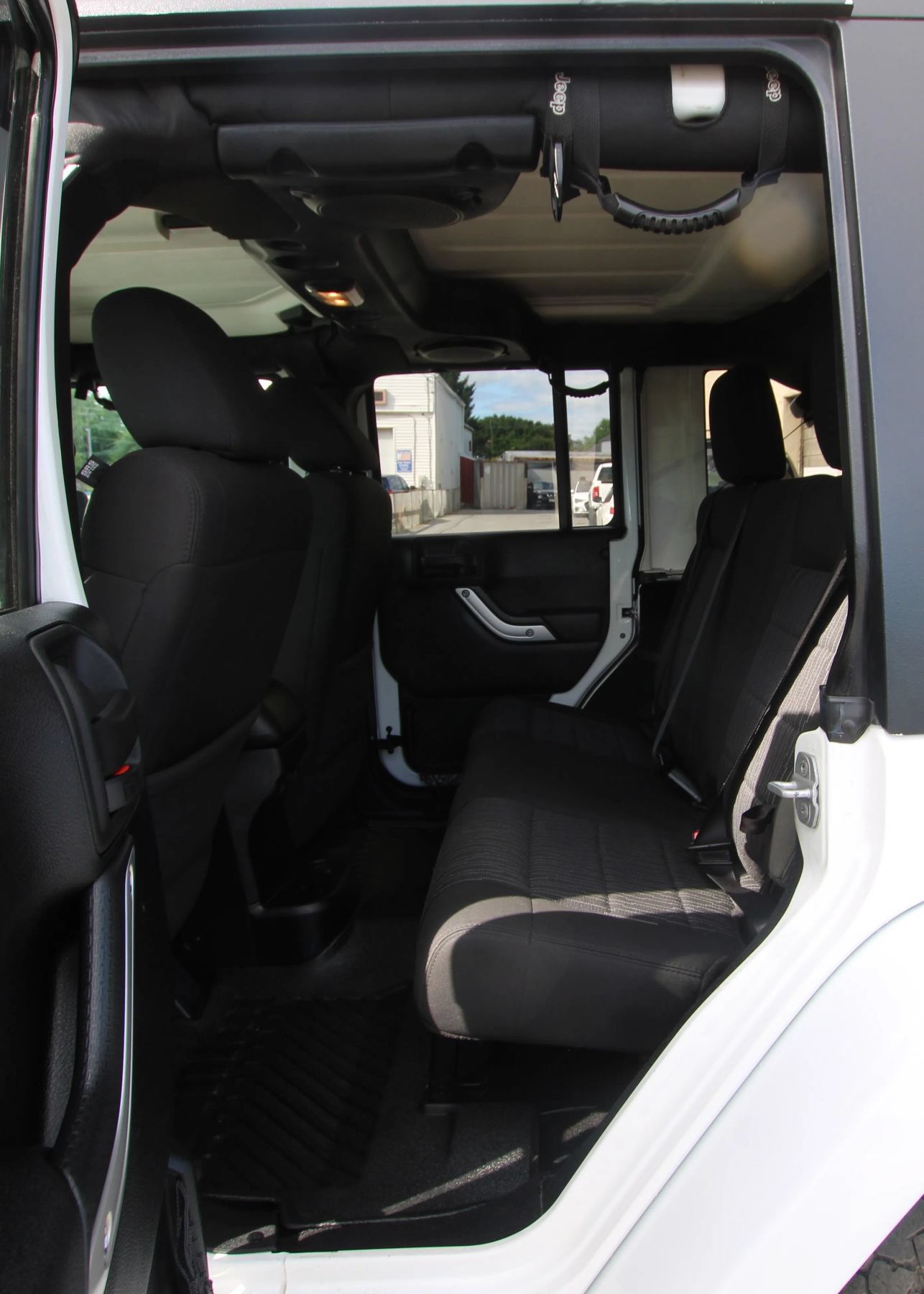 Used 2012 Jeep Wrangler Unlimited Sahara w/ Dual Top Group AWD/4WD image 11