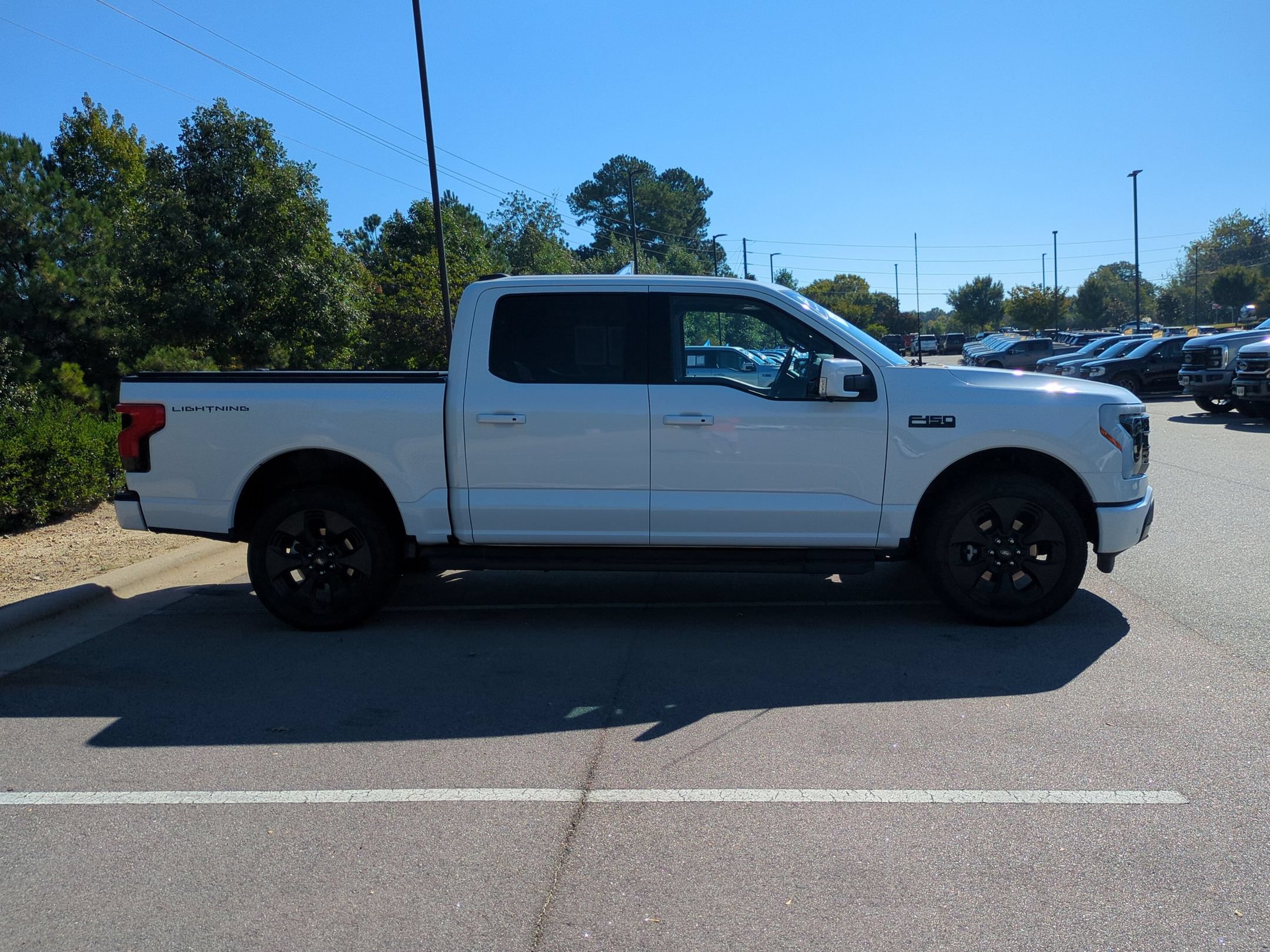 Certified 2025 Ford F150 Lightning Platinum w/ Dark Elements Package AWD/4WD image 3