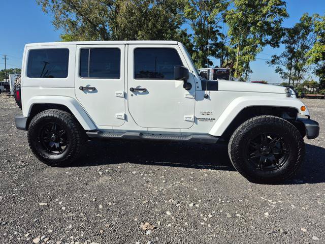 Used 2016 Jeep Wrangler Unlimited Sahara w/ Connectivity Group AWD/4WD image 1