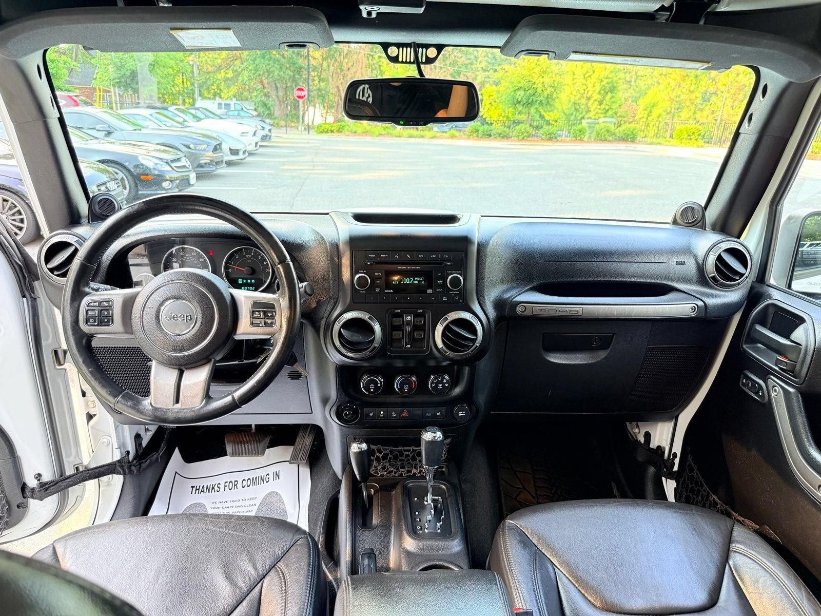 Used 2013 Jeep Wrangler Unlimited Sahara AWD/4WD image 32