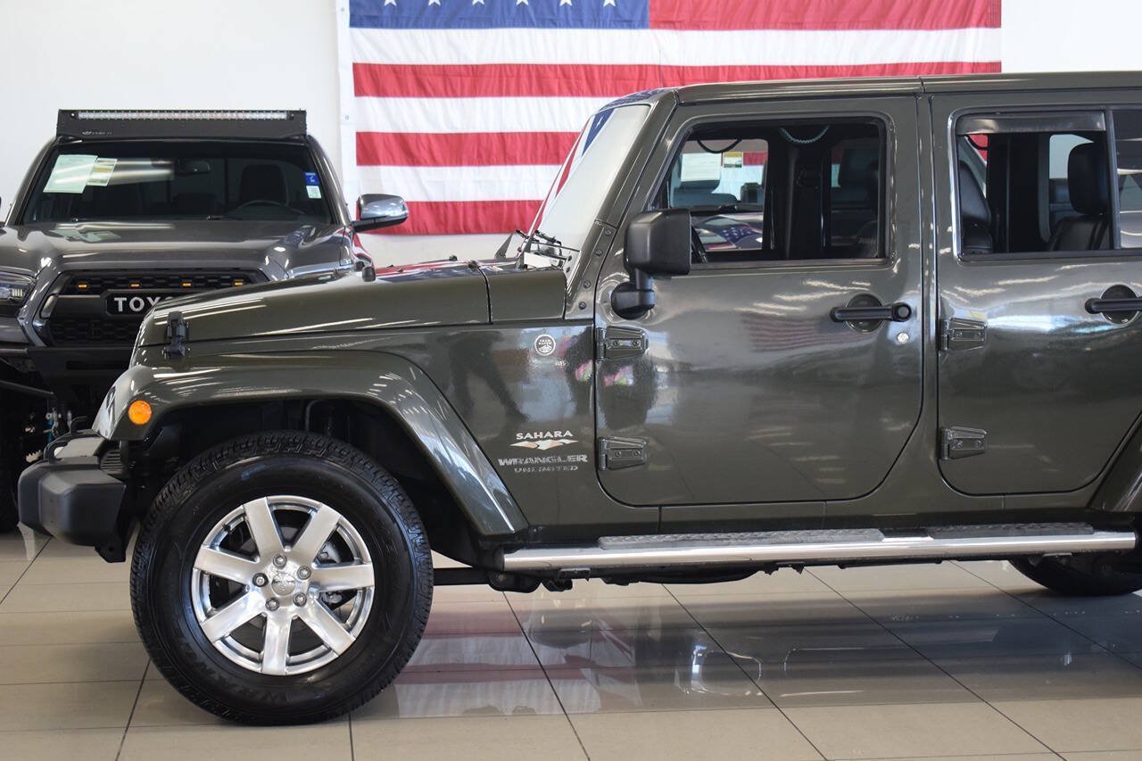 Used 2015 Jeep Wrangler Unlimited Sahara w/ Dual Top Group AWD/4WD image 21