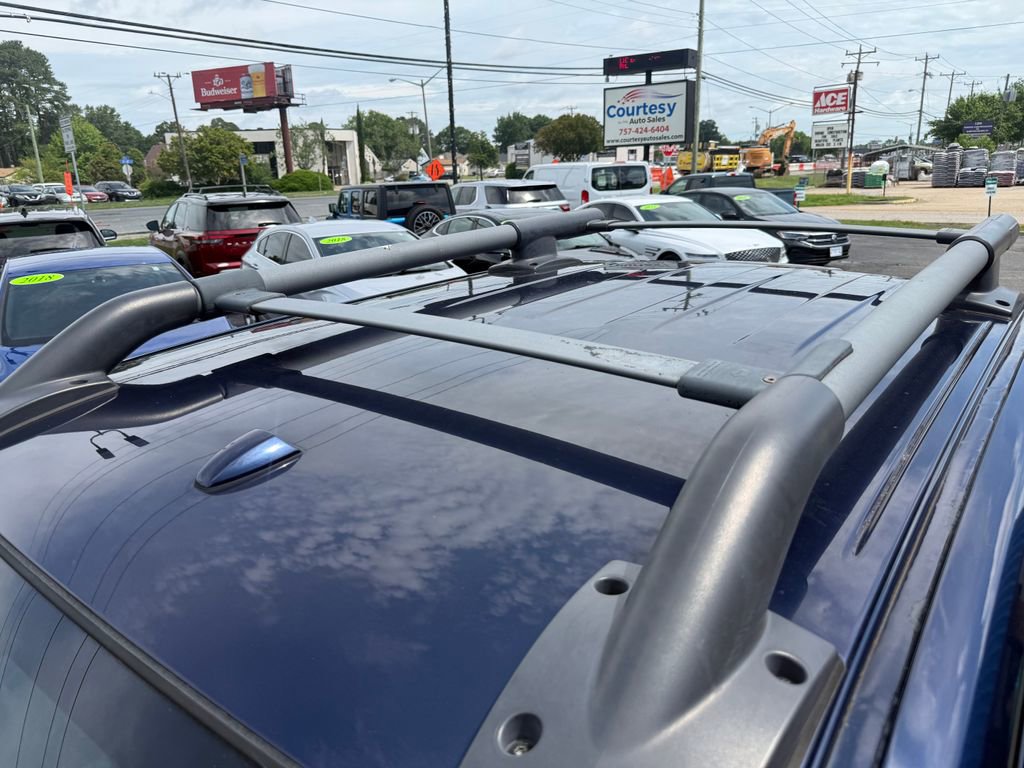 Used 2010 Nissan Frontier LE w/ LE Value Truck Pkg AWD/4WD image 14