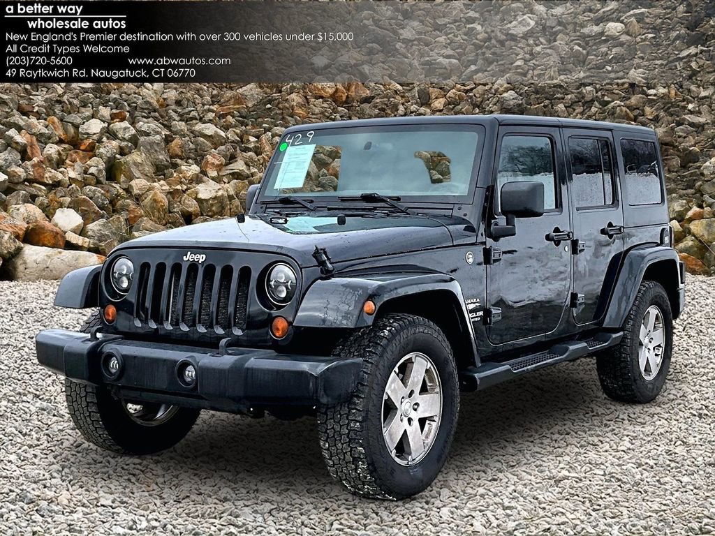 Used 2012 Jeep Wrangler Unlimited Sahara w/ Dual Top Group image 1