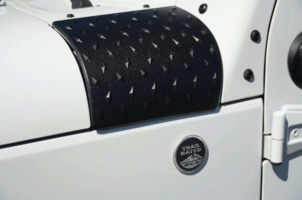 Used 2014 Jeep Wrangler Unlimited Sport w/ Mopar Black Appearance Group AWD/4WD image 11