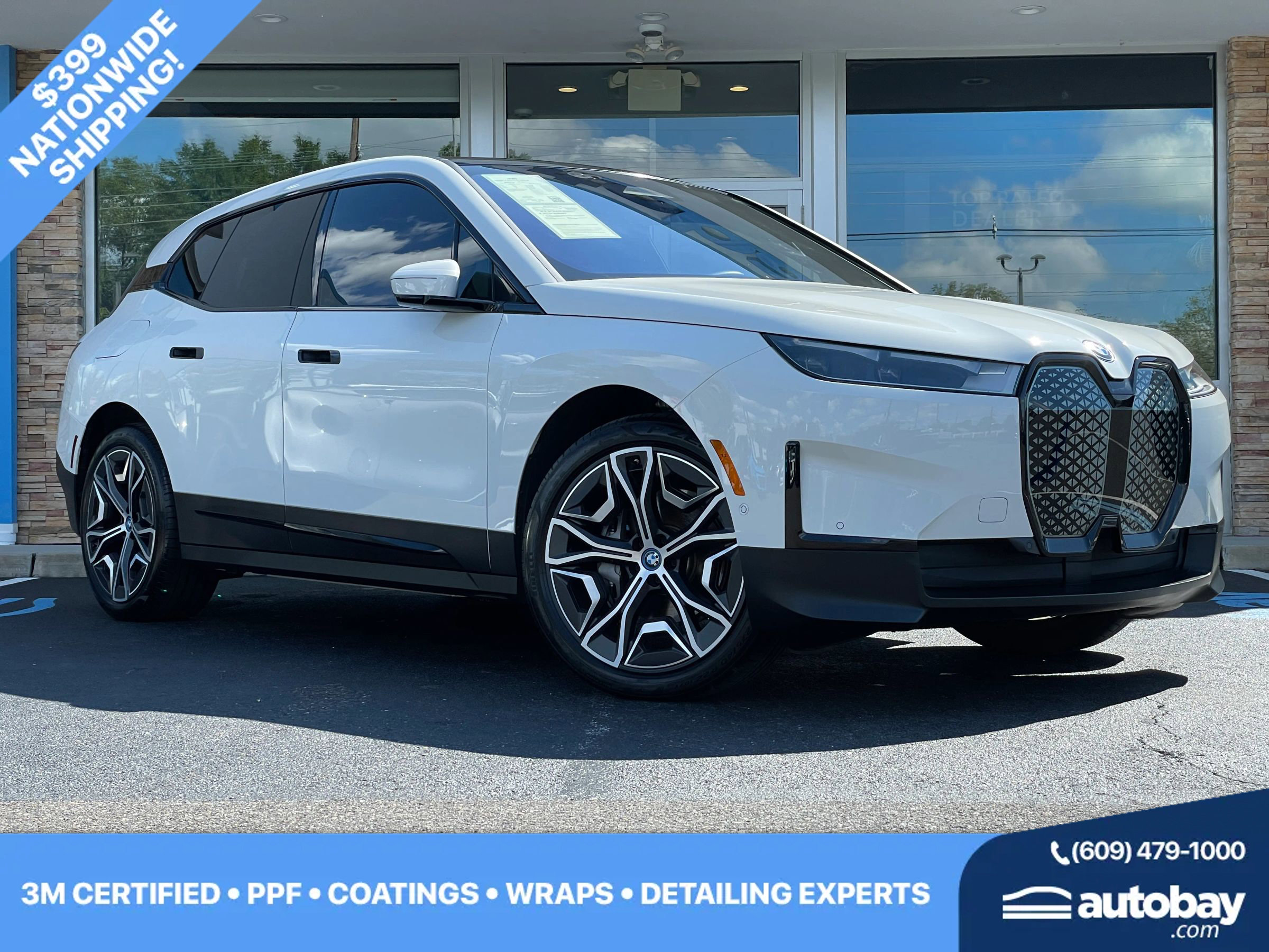 Used 2024 BMW iX xDrive50 w/ Luxury Package image 1