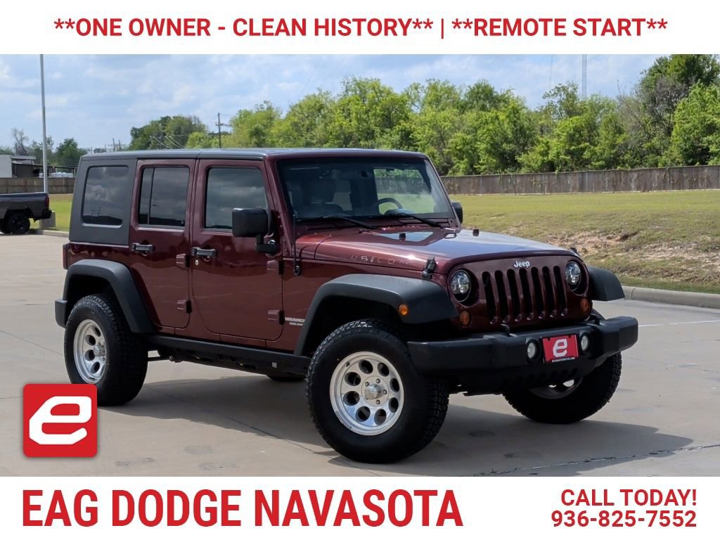 Used 2010 Jeep Wrangler Unlimited Rubicon w/ Dual Top Group image 1