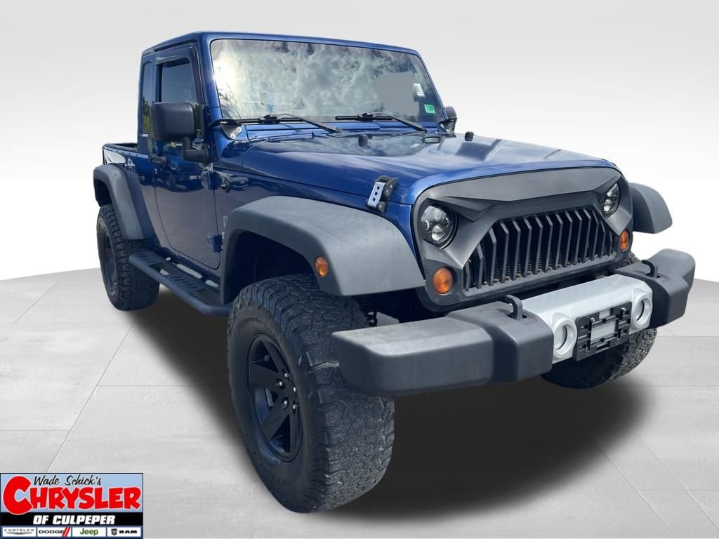 Used 2010 Jeep Wrangler Unlimited Sport image 1