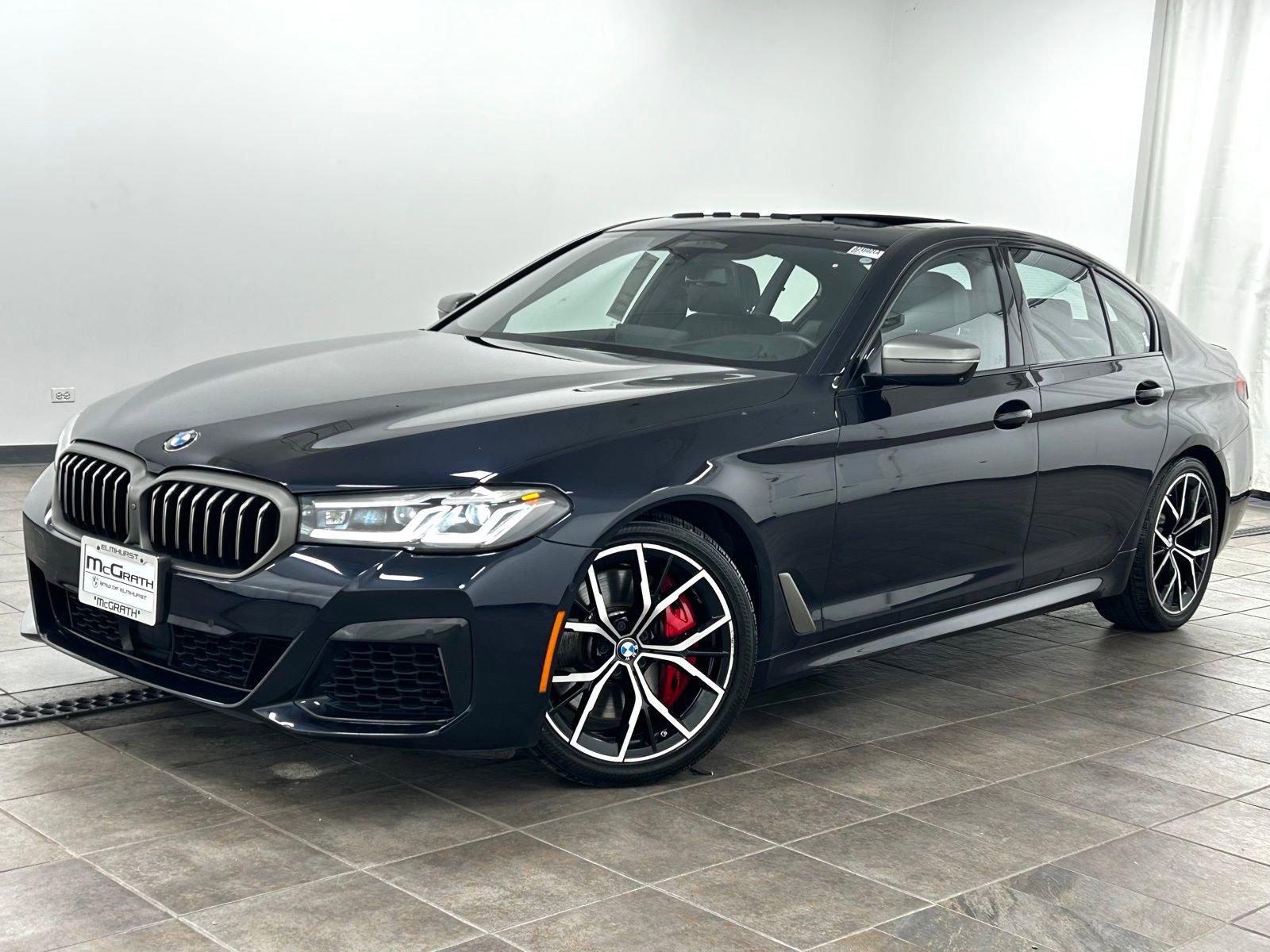 Used 2021 BMW M550i xDrive w/ Executive Package image 1