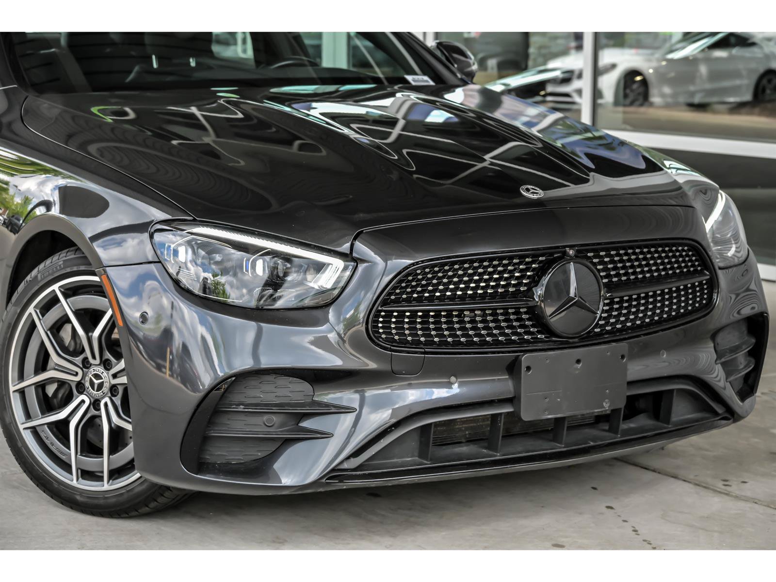 Certified 2022 Mercedes-Benz E 350 4MATIC Sedan w/ AMG Line Exterior image 2