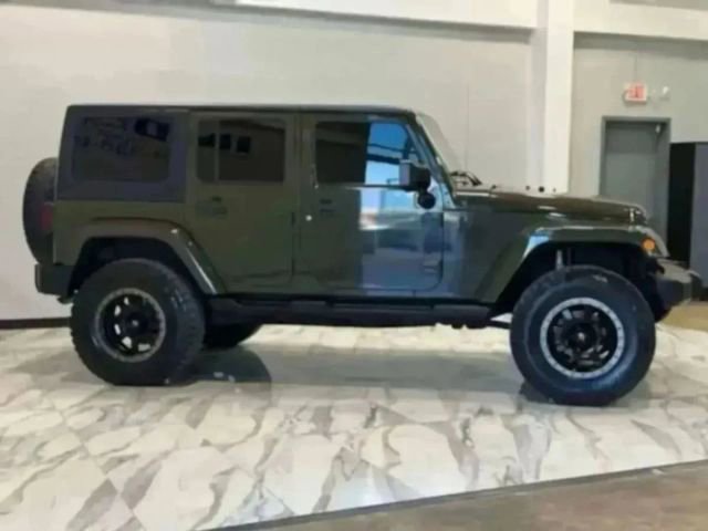 Used 2015 Jeep Wrangler Unlimited Sahara w/ Max Tow Package image 25