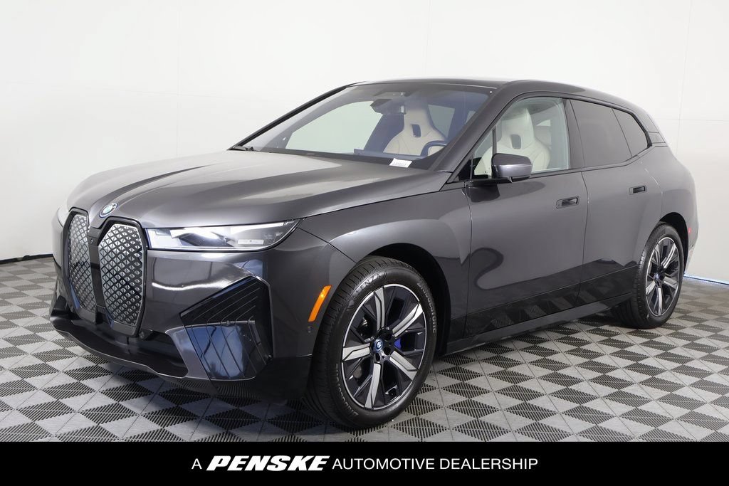 Used 2024 BMW iX xDrive50 w/ Premium Package AWD/4WD image 1