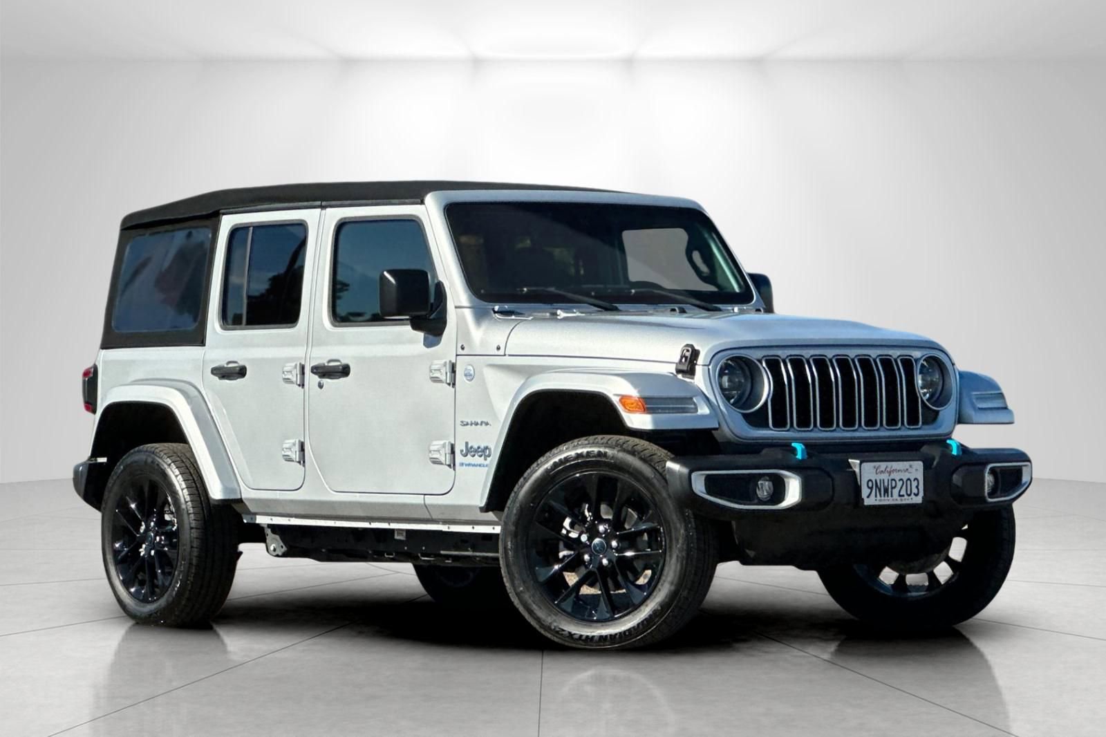 Used 2024 Jeep Wrangler Sahara 4xe image 1