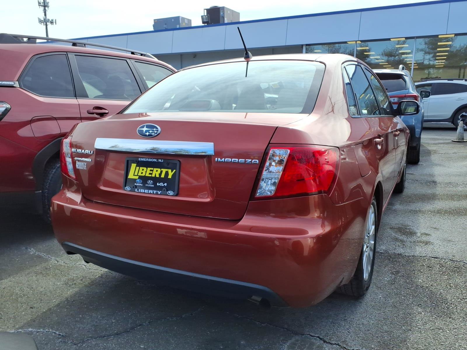 Used 2011 Subaru Impreza 2.5i Premium w/ PWR Moonroof Value Pkg image 4