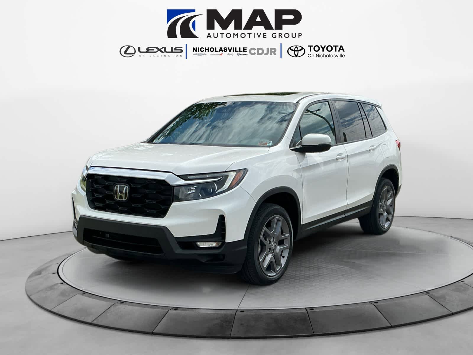 Used 2023 Honda Passport EX-L image 1