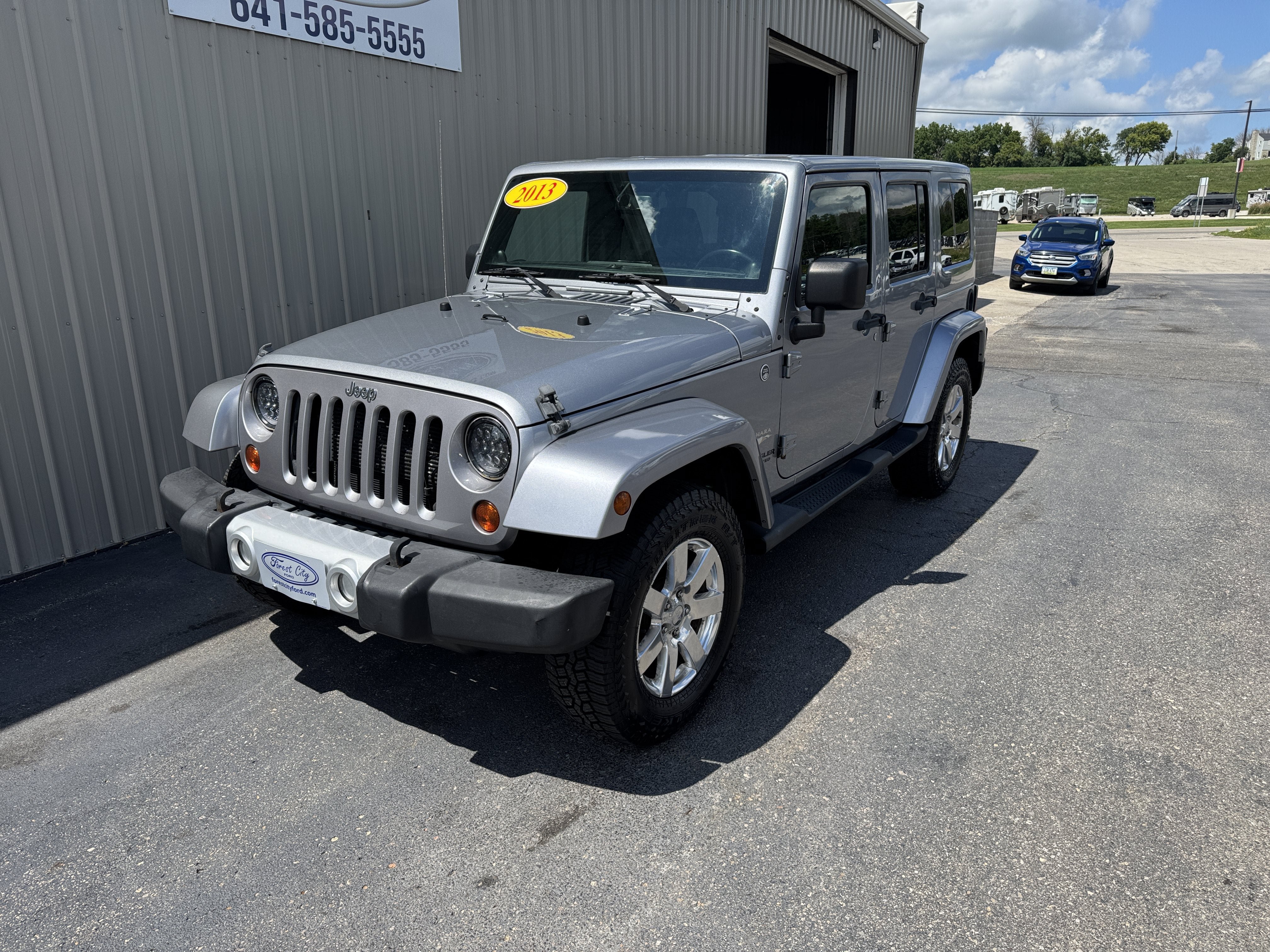 Used 2013 Jeep Wrangler Unlimited Sahara w/ Dual Top Group AWD/4WD image 2