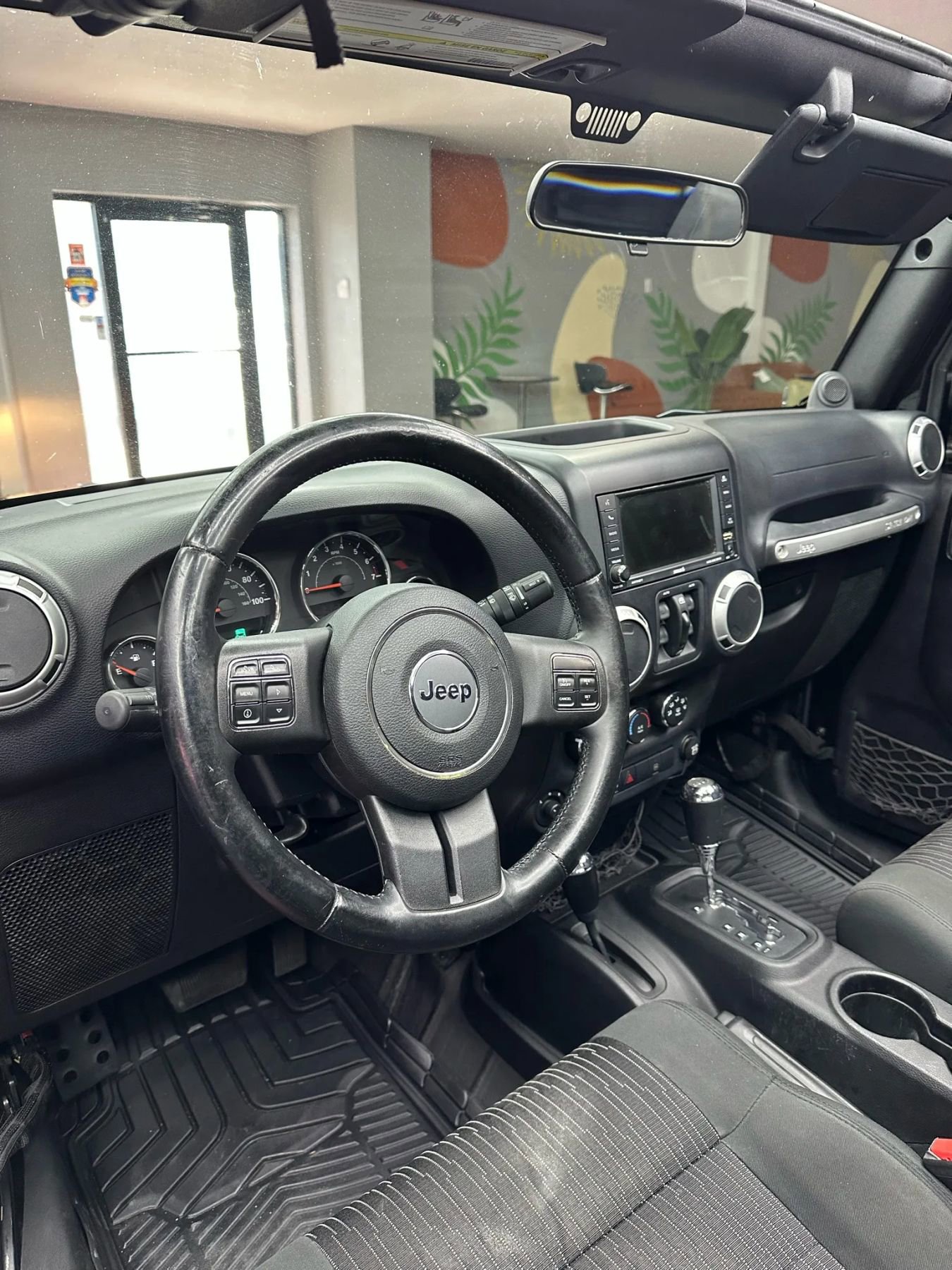 Used 2012 Jeep Wrangler Unlimited Sahara w/ Dual Top Group AWD/4WD image 11
