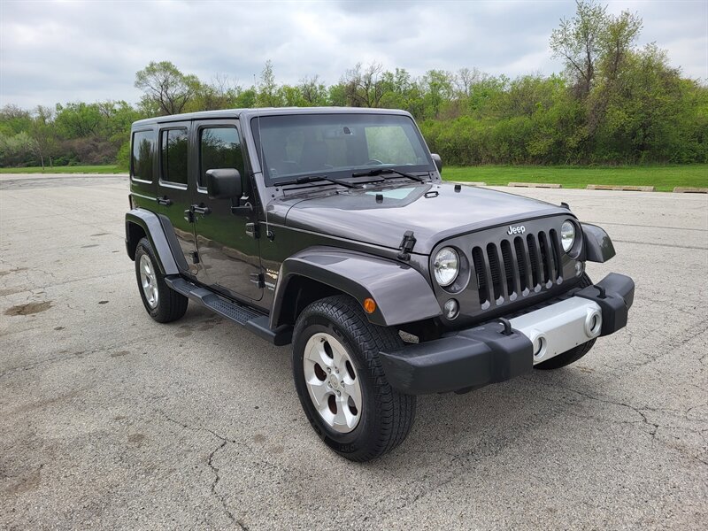 Used 2014 Jeep Wrangler Unlimited Sahara w/ Dual Top Group AWD/4WD image 5