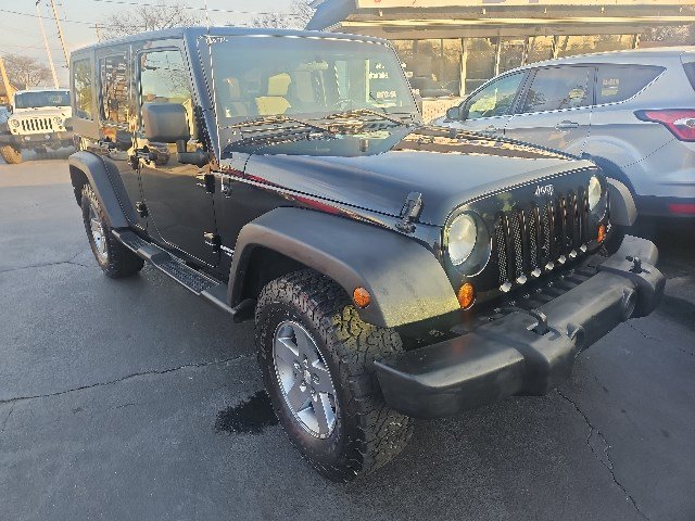 Used 2010 Jeep Wrangler Unlimited Rubicon w/ Dual Top Group AWD/4WD image 1