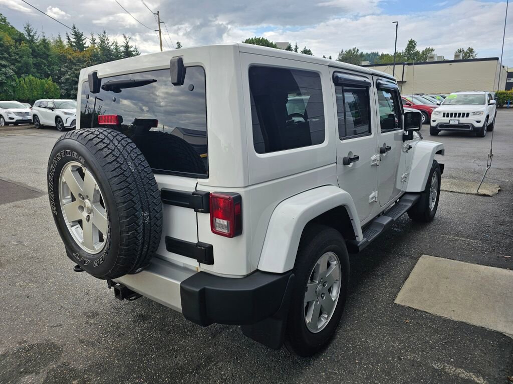 Used 2012 Jeep Wrangler Unlimited Sahara w/ Dual Top Group AWD/4WD image 6