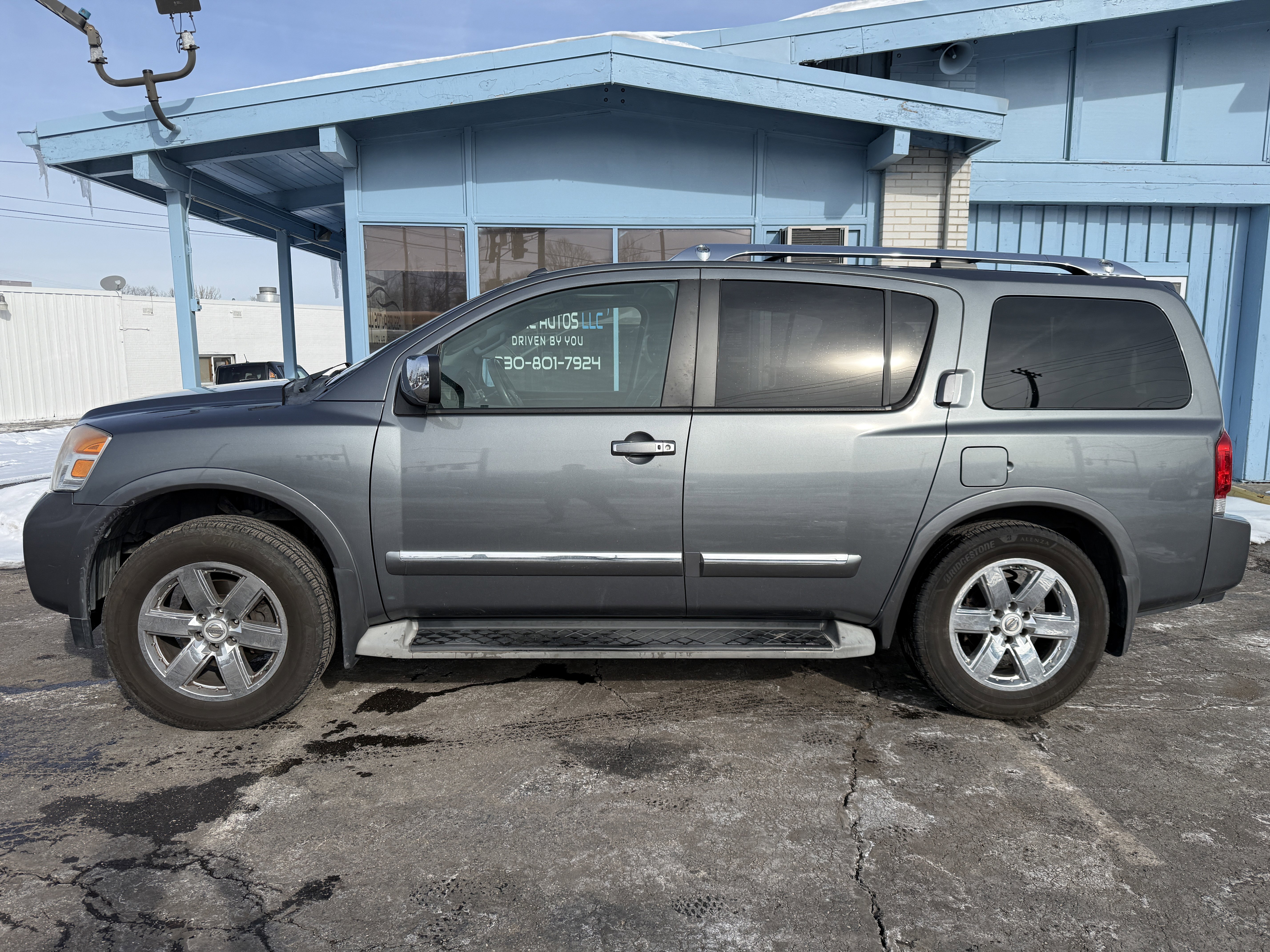 Used 2014 Nissan Armada Platinum w/ 2nd Row Captain Seat Package image 2