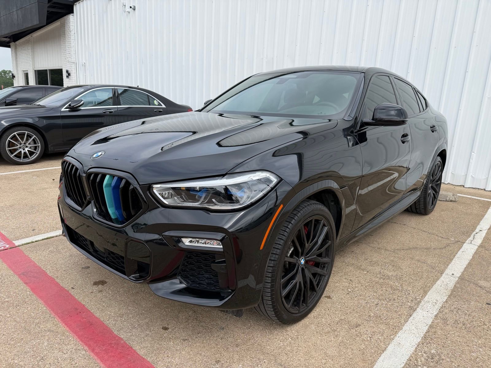Used 2021 BMW X6 M50i w/ Executive Package AWD/4WD image 1
