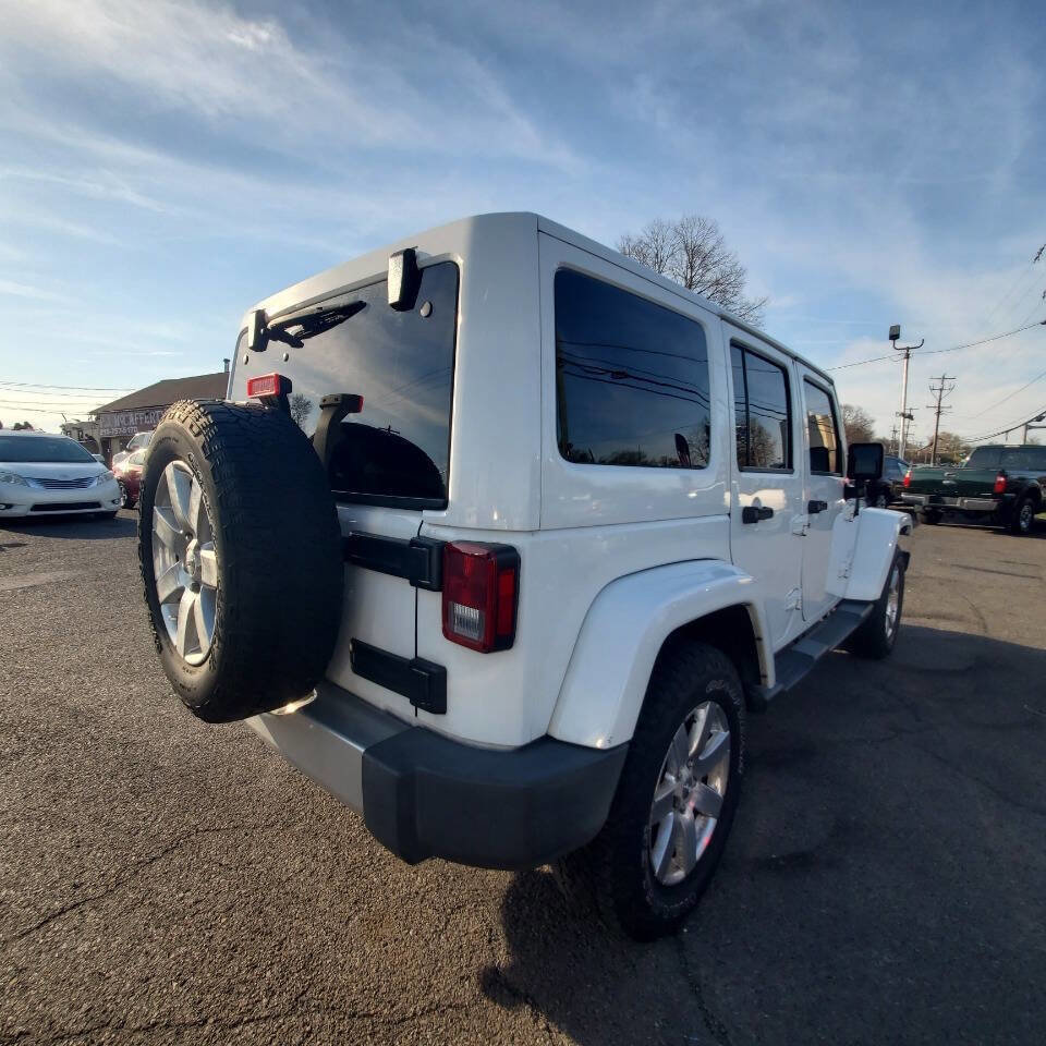 Used 2015 Jeep Wrangler Unlimited Sahara w/ Dual Top Group AWD/4WD image 5