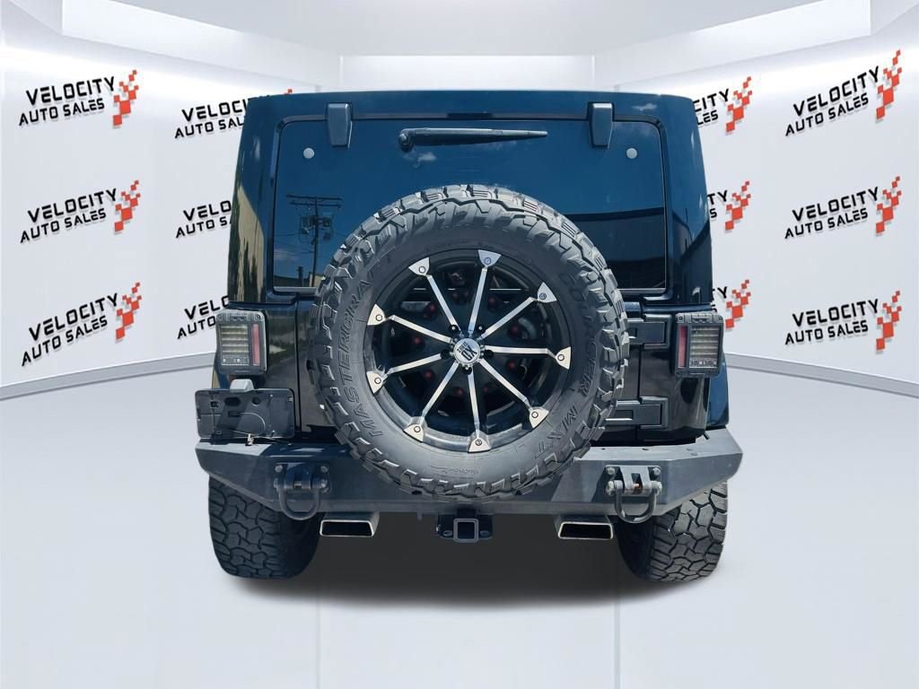Used 2014 Jeep Wrangler Unlimited Sahara w/ Connectivity Group AWD/4WD image 4