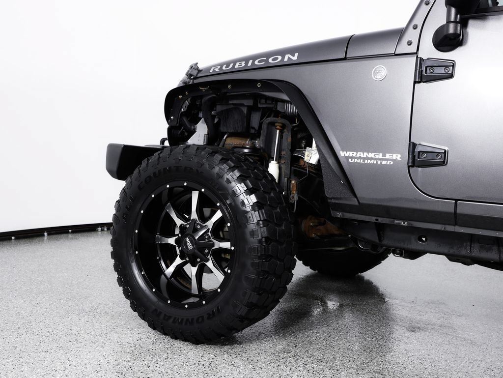 Used 2014 Jeep Wrangler Unlimited Rubicon w/ Dual Top Group AWD/4WD image 6