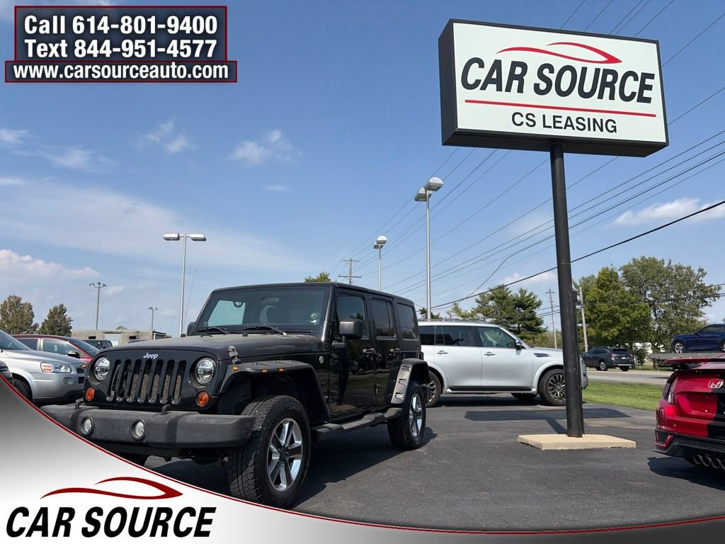 Used 2011 Jeep Wrangler Unlimited Sport AWD/4WD image 1