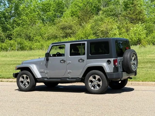 Used 2016 Jeep Wrangler Unlimited Sahara w/ Dual Top Group AWD/4WD image 25
